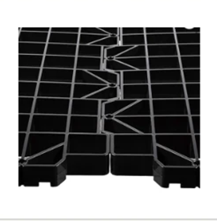 Close-up of the open-grid interlocking attic platform panel