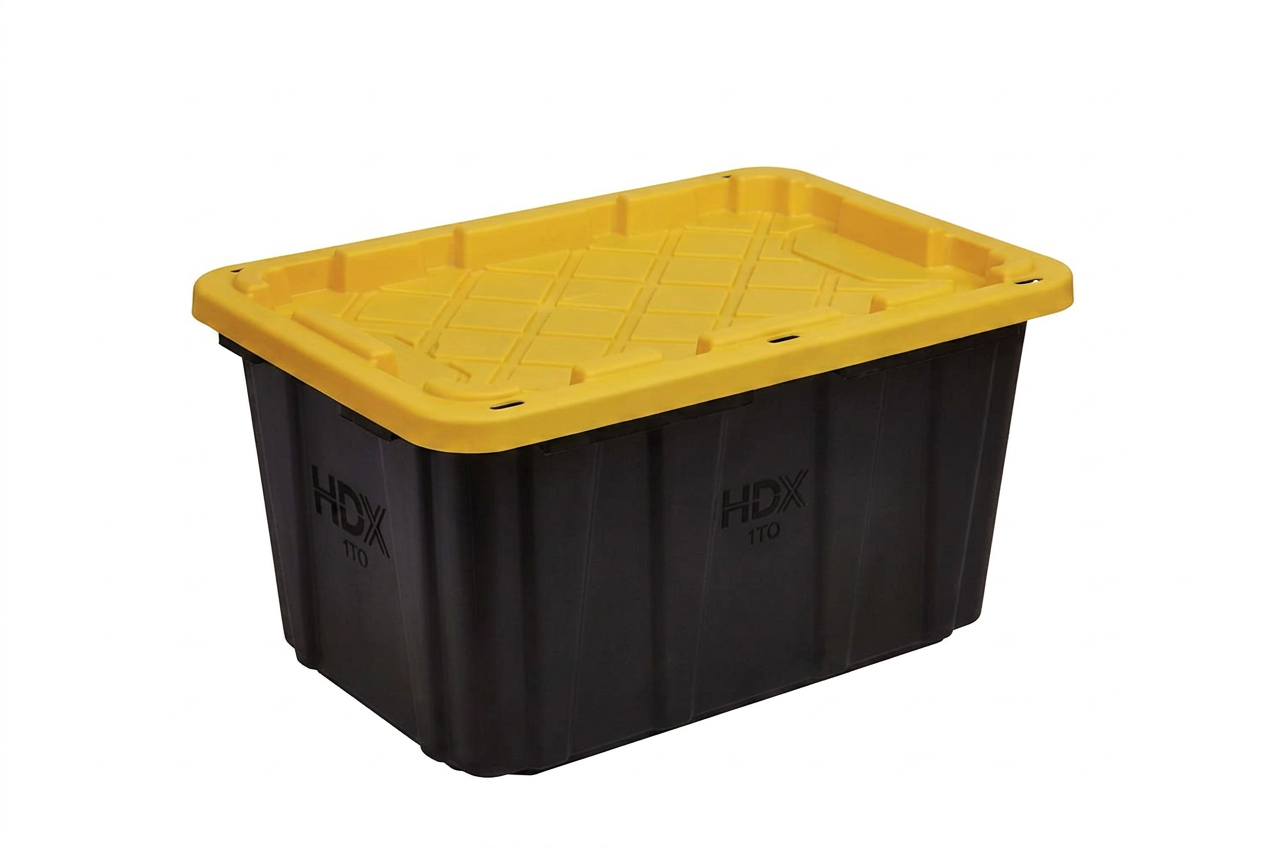Single black storage bin with a yellow lid