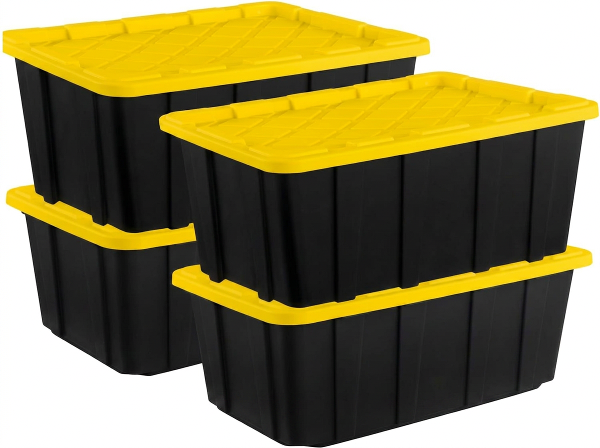 Four stacked black storage bins with yellow lids